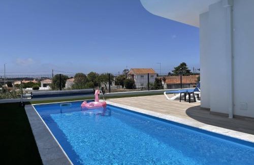 Nadadouro Villa | Oceanfront Casa Felino: Top-Rated Stays with Pool Access