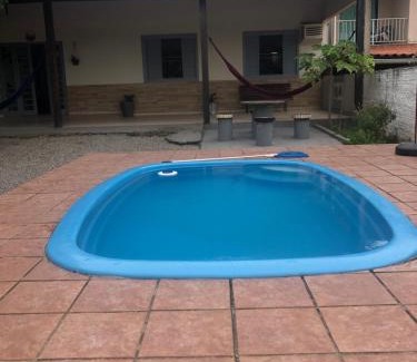 Palhoca House | Pet-Friendly Oasis at Casa Feliz with Pool & Family Fun