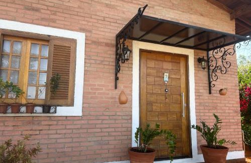 Aguas de Sao Pedro House | Pet-Friendly Haven: Discover Casa Flor de Lis, Rated 10/10