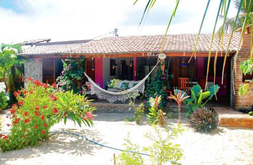 Icarai de Amontada Villa | Casa Floreal: Oceanfront Retreat with Free Wifi & Breakfast