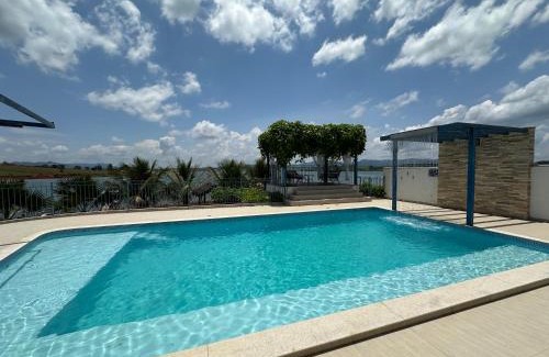 Guape House | Discover Casa Florida do Lago: Oceanfront Oasis Awaits