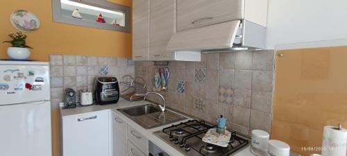 Roccalumera House | Cozy Casa Fronte Mare: Oceanfront Family-Friendly Retreat