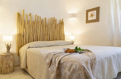 La Conia House | Seaside Escape: Casa Giardino with Child-Friendly Amenities