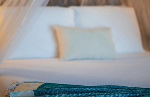 Mahahual Hotel | Casa Hayhu: Oceanfront Stay with Private Beach and Hot Tub