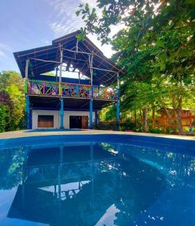 Capurgana House | Budget-Friendly Casa Hostal Playa Coral with Pool & Pets