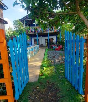 Capurgana House | Budget-Friendly Casa Hostal Playa Coral with Pool & Pets