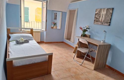 Cisano sul Neva Apartment | Discover Casa Iris: Family & Pet-Friendly Retreat Awaits