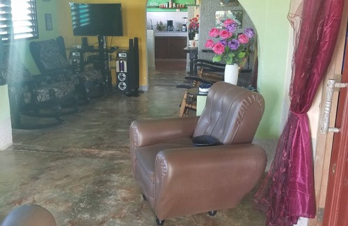 Puerto Esperanza House | Discover Casa Ismael y Laura: Relax with Spa & Dining