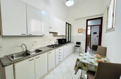 Capaci House | Cozy Casa Kennedy: Guest Rated 9.2 with Family & Pet Perks
