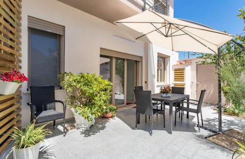 Cabras House | Pet-Friendly CASA L'ANGOLO FIORITO with Oceanfront Views