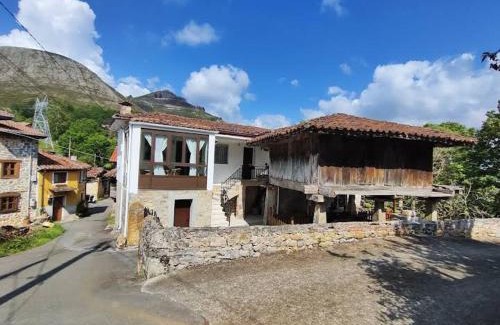 Llueves House | Experience Casa La Cruz: Family-Friendly Stay Near Cangas