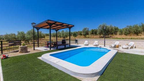 Setenil de las Bodegas House | Discover Casa La Limosna: Top-Rated Retreat in Setenil