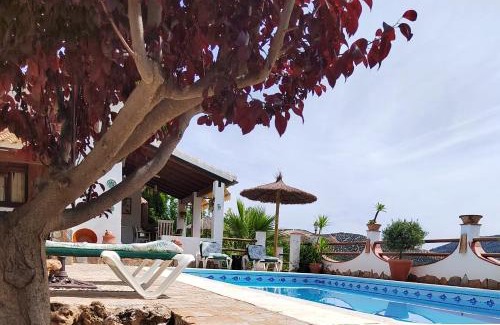 Iznajar House | Pet-Friendly Oasis: Casa la Serena with Pool & Child Access
