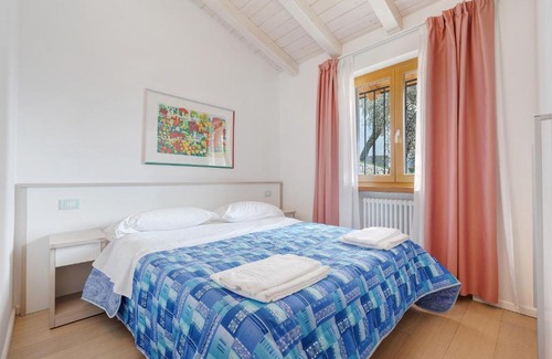 Magugnago Apartment | Relax at Casa-Lago Suite 51: Pet-Friendly & Pool Access