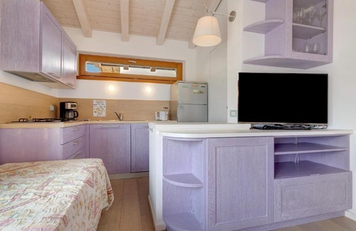 Magugnago Apartment | Relax at Casa-Lago Suite 51: Pet-Friendly & Pool Access