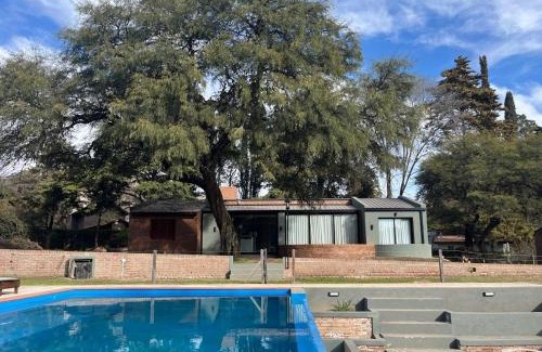 Villa General Belgrano House | Inviting Casa Las Magnolias with Oceanfront Pool & Hot Tub