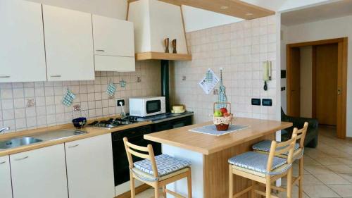 Baselga di Pine Apartment | Discover Casa Lucia: Mountain Views & Family-Friendly Stays