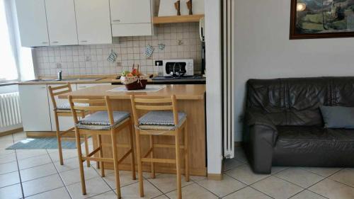 Baselga di Pine Apartment | Discover Casa Lucia: Mountain Views & Family-Friendly Stays