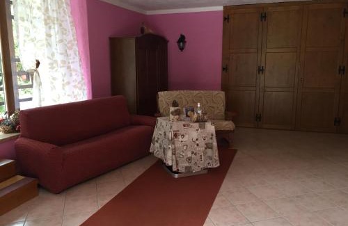 Comano Terme Apartment | Discover Casa Luigina: Pet-Friendly with Breakfast Included