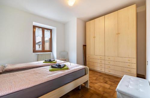 Vesio Apartment | Discover Casa Luisa: Family-Friendly Retreat by Lake Garda