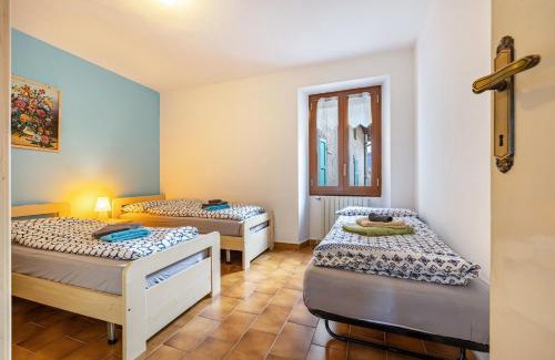 Vesio Apartment | Discover Casa Luisa: Family-Friendly Retreat by Lake Garda