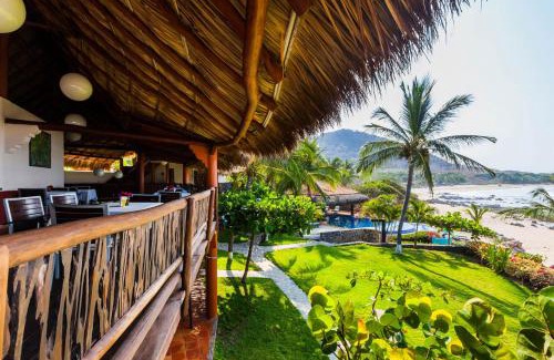 Troncones Bed & Breakfast | Oceanfront Point Room at Casa Manzanillo - Rated 9/10