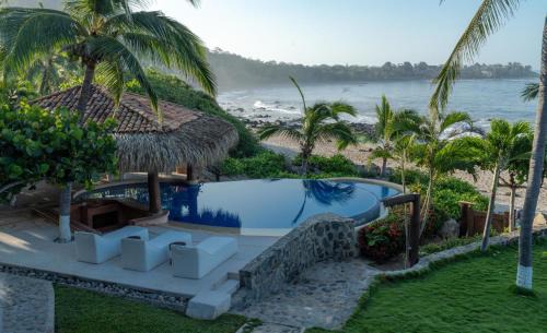 Troncones Bed & Breakfast | Oceanfront Point Room at Casa Manzanillo - Rated 9/10