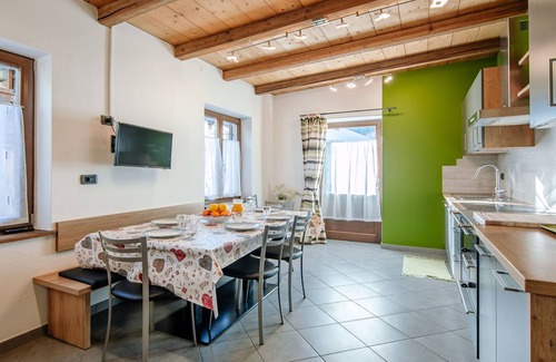 Canazei Apartment | Discover Casa Marta: Pet-Friendly Retreat with Lake View