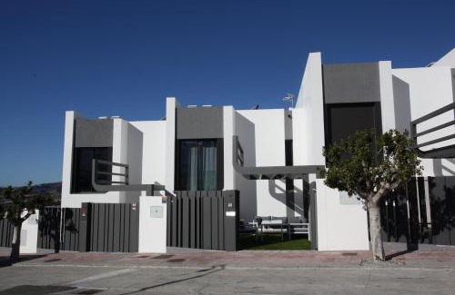 Caleta de Velez House | Elegant Casa Melocotón with Private Pool by the Golf Course
