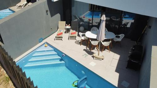 Caleta de Velez House | Elegant Casa Melocotón with Private Pool by the Golf Course