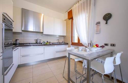 Rivoltella Apartment | Discover Casa Michelangelo: Lake View & Family-Friendly Stay