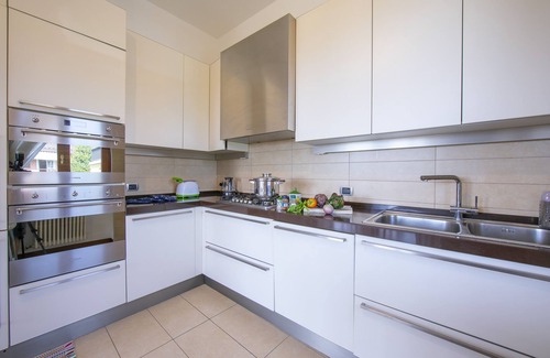 Rivoltella Apartment | Discover Casa Michelangelo: Lake View & Family-Friendly Stay