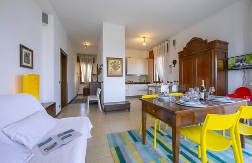 Rivoltella Apartment | Discover Casa Michelangelo: Lake View & Family-Friendly Stay