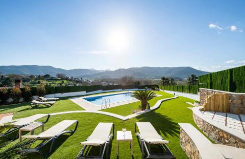 Banyoles House | Casa Mirestany - Breathtaking Ocean Views & Poolside Bliss