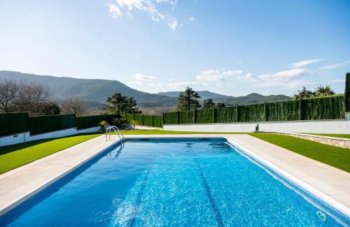 Banyoles House | Casa Mirestany - Breathtaking Ocean Views & Poolside Bliss