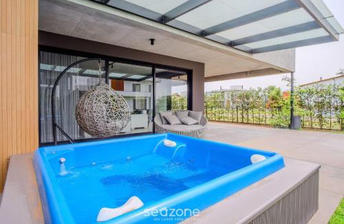 Praia do Rosa House | Casa moderna c/piscina ao lado do Surfland ROI009