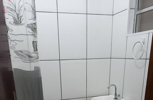 Maracana House | Family-Friendly Stay at Casa na Praia Grande - SP