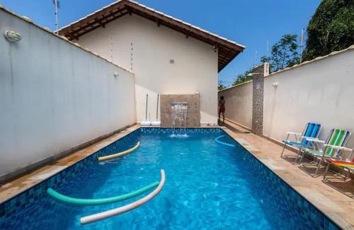 Santa Terezinha House | Beachfront Casa Nova: Pool, BBQ Area & Pet-Friendly Stay
