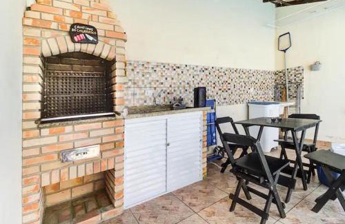 Santa Terezinha House | Beachfront Casa Nova: Pool, BBQ Area & Pet-Friendly Stay