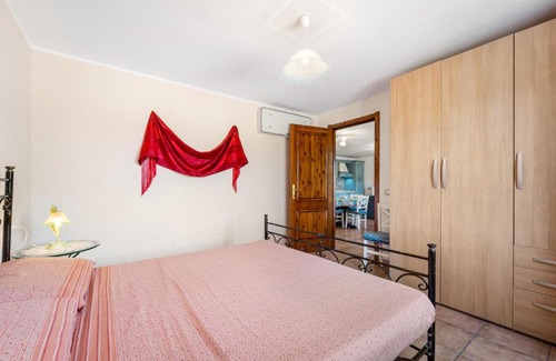 Buggerru House | Experience Casa Oleandro: Pet-Friendly 4-Star Haven