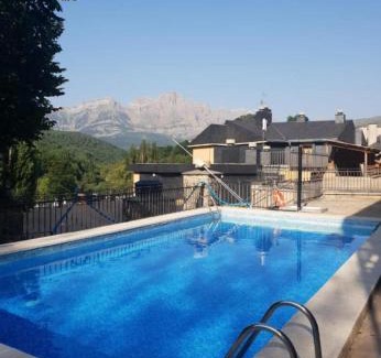 Panticosa Apartment | Casa Orval: Guest Rated 9.8 with Pool & Family Amenities