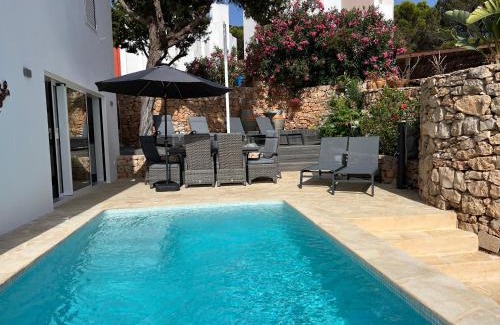Sant Josep de sa Talaia Villa | Discover Casa Palm Tree: Oceanfront Oasis for Families