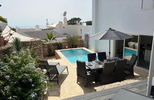 Sant Josep de sa Talaia Villa | Discover Casa Palm Tree: Oceanfront Oasis for Families