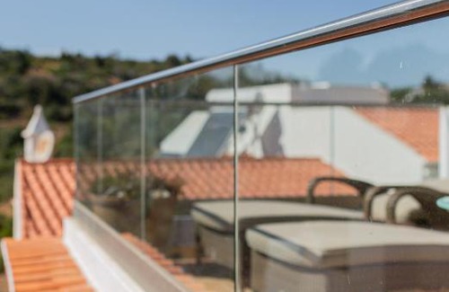 Salema Apartment | Oceanview Retreat: Casa Pedro in Salema, Pet & Child Friendly