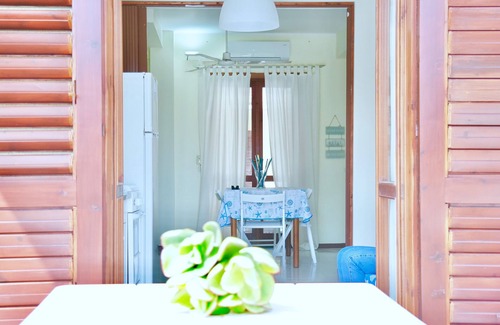 Fondachello Apartment | Relax at Casa Perla: Oceanfront Views & Spa Retreat