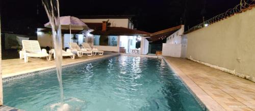 Jardim Neptunia House | Casa piscina pé na areia Indaiá