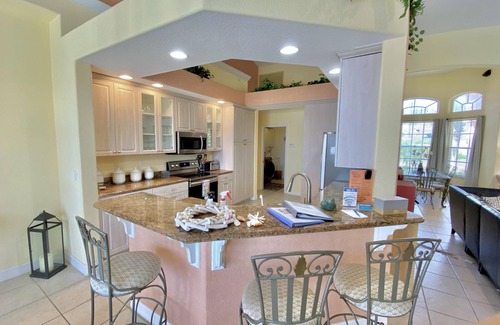 Burnt Store Villa | Casa Primavera: Oceanfront Retreat with Spa & Family Amenities