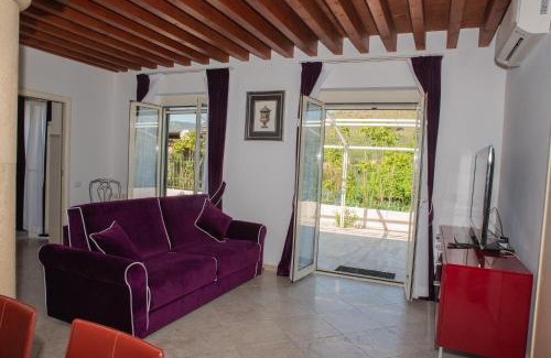 Tivoli Apartment | Top-Rated Casa Rosa with Free Parking and Wi-Fi Access