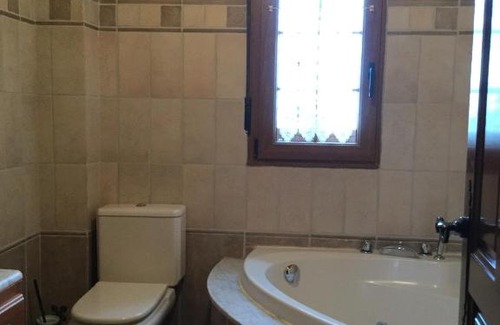 Santa Maria de Valdeon House | Discover Casa Rural El Hórreo: Pet-Friendly Retreat with Hot Tub