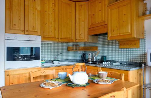 Granvilla Apartment | Explore Casa Sappada: Family-Friendly Retreat with Great Ratings